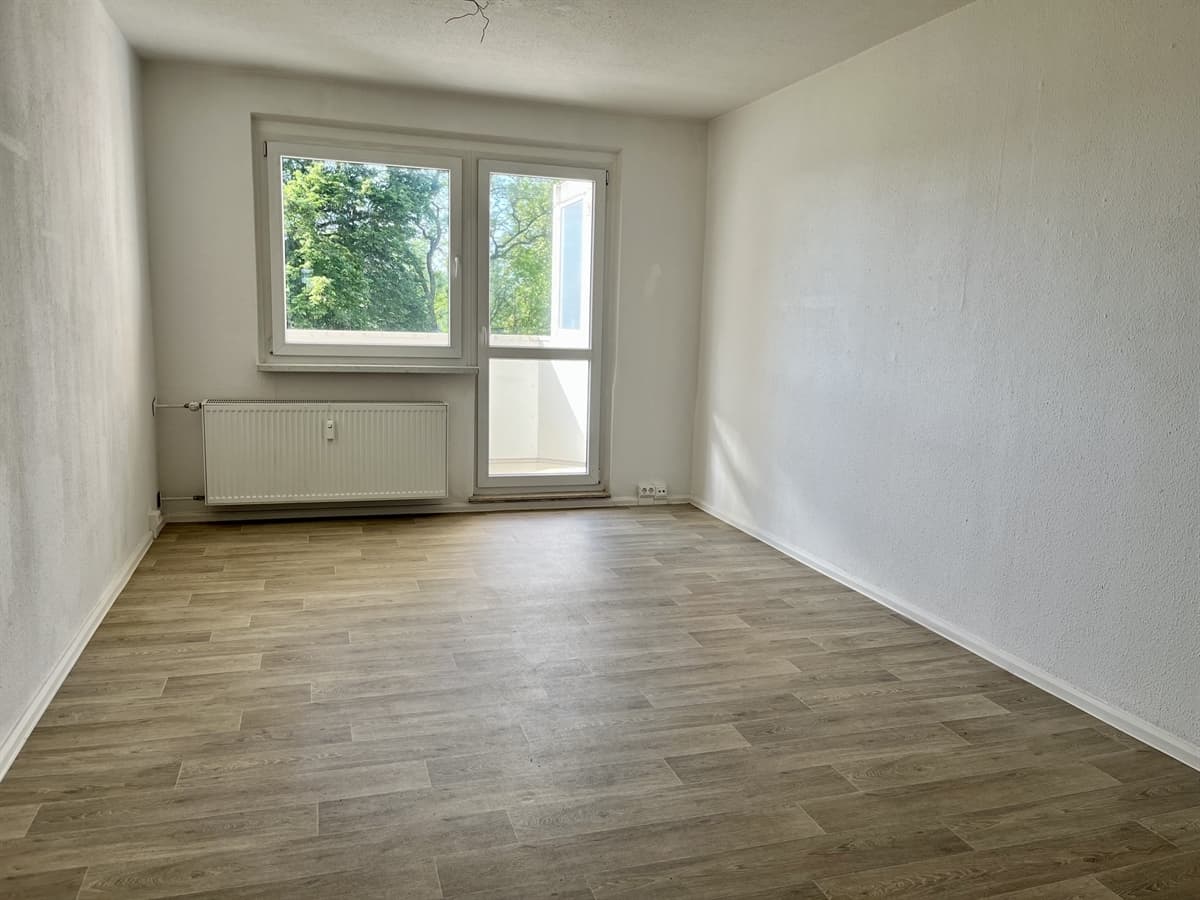 Geräumige Dreiraumwohnung im Erdgeschoss mit Balkon - Ansicht 2
